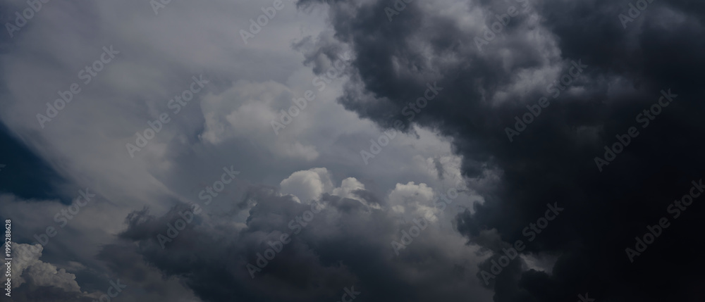 Fototapeta premium Dark Clouds rain storm and sun beam in storm. Dramatic sky background