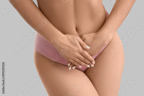 Young woman in underwear on...