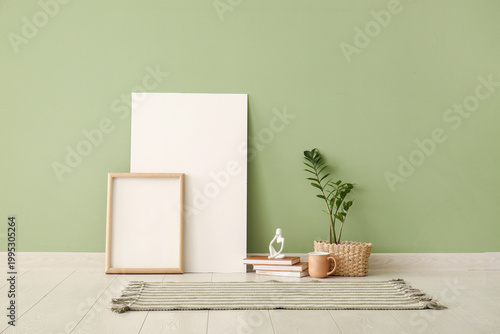 Blank posters, houseplant a...