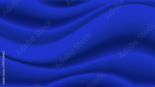 Smooth flowing blue silk and satin waves create an abstract motion background with a soft liquid textile texture design