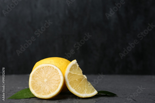 Fresh whole and sliced lemo...