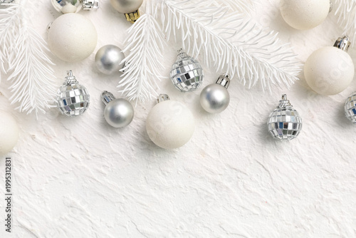 Silver Christmas baubles on...