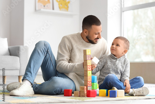 Happy father and his little...