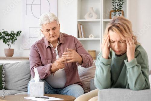 Stressed mature woman and h...