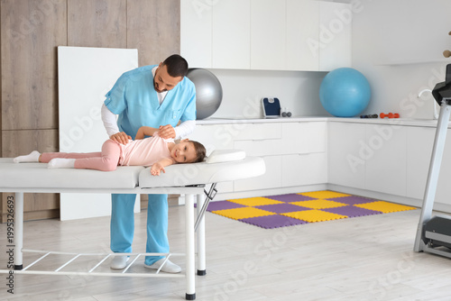 Cute little girl with physi...