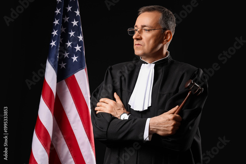 Mature judge with gavel and...