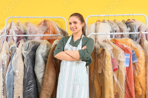 Female worker of dry-cleane...