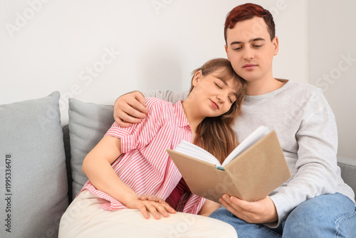Young woman with hearing ai...