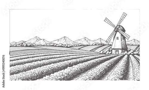 Rural landscape with windmill and cultivated fields under mountains agriculture
