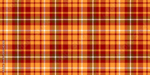 Seamless warm orange plaid fabric pattern with classic tartan textile design suitable for fashion and home decor