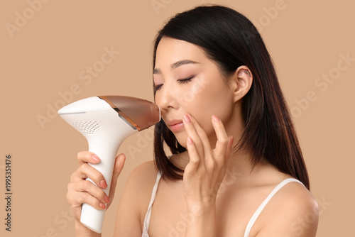 Pretty Asian woman using ph...