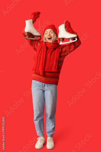 Happy young woman with ice ...