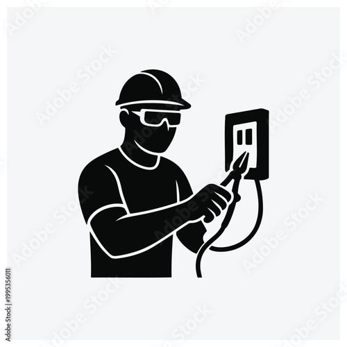 Electrician testing or inspecting electrical panel or circuit breaker