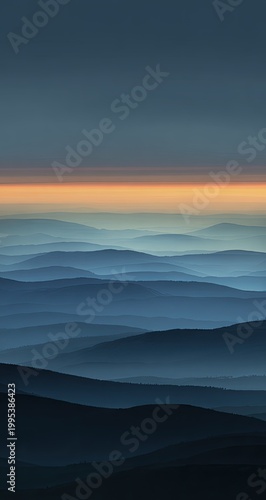 Hazy blue mountain layers fade into an orange horizon
