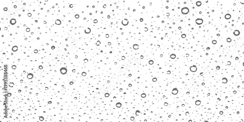 Abstract water droplets elegantly scattered across a clean, transparent surface, creating a visual symphony of nature's simple beauty.