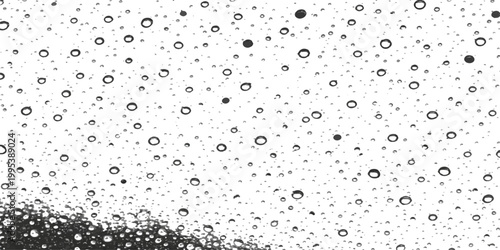 Abstract an artistic macro shot of a multitude of glistening water droplets on a transparent surface, showcasing nature's delicate beauty.