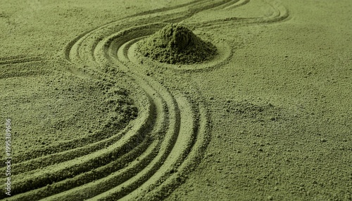 Top down view of green matcha tea powder raked in zen garden pattern