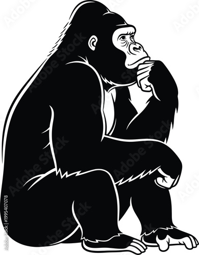 Gorilla sitting in thoughtful pose with hand on chin looking sideways