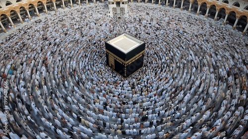 Aerial view of a massive crowd of pilgrims circumambulating the Kaaba during Hajj, Mecca, Saudi Arabia, surrounded by ancient architecture