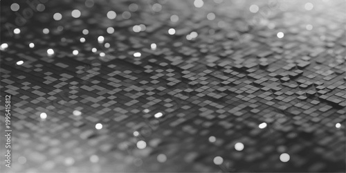 An artistic close-up reveals intricate texture and light effects in a grayscale composition, creating a visually stunning abstract.