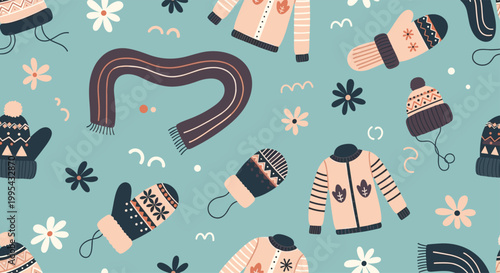 Seamless pattern with winter clothing items including sweaters, mittens, scarves, and hats on a muted blue background with flowers.