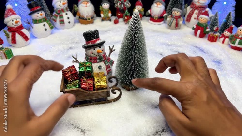 Christmas Scene Setup with Snowman and Tree.