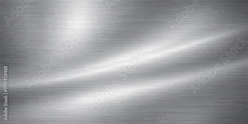 A shiny silver brushed metal texture featuring a polished stainless steel plate pattern with light reflections on a gray industrial aluminum surface material backdrop