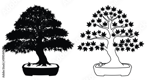 Two stylized bonsai trees one black and one white in pots