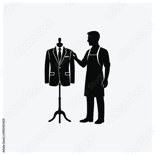 Silhouette of a man adjusting a suit on a display mannequin