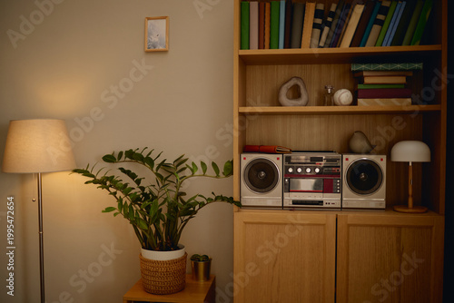 Tableau sur toile Living room interior featuring vintage stereo system on bookshelf, suggesting home confinement and isolation concept