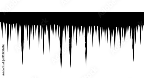 Sharp jagged black icicles hanging down from a dark horizontal edge against a clean white background evoking cold winter weather and frosty conditions