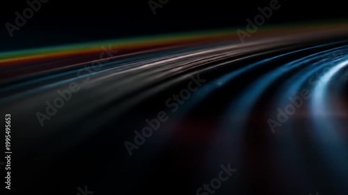Abstract colorful light trails against a dark background dynamic design