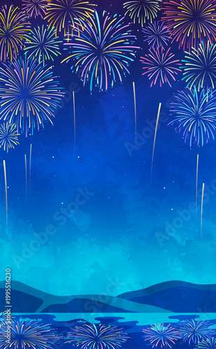 田舎に打ち上がるカラフルな花火の背景_縦