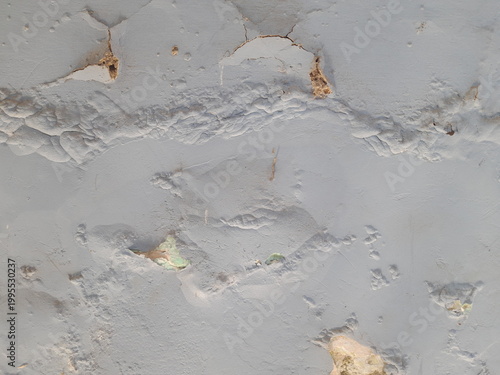 Canvas Print Close-up view of cracked, textured wall with spalled sections on a wall surface