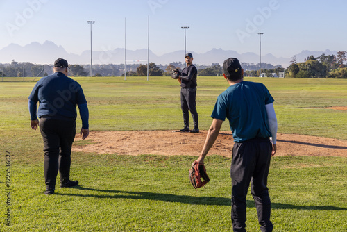 Pitcher prepping glove while fielder walking in, showing animated sports arc over mound and stats