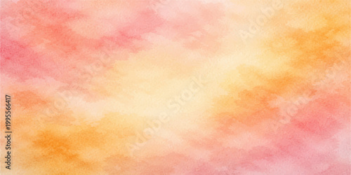 Abstract colorful watercolor background with soft pastel texture and warm yellow orange paint blending on paper creating a smooth artistic design backdrop