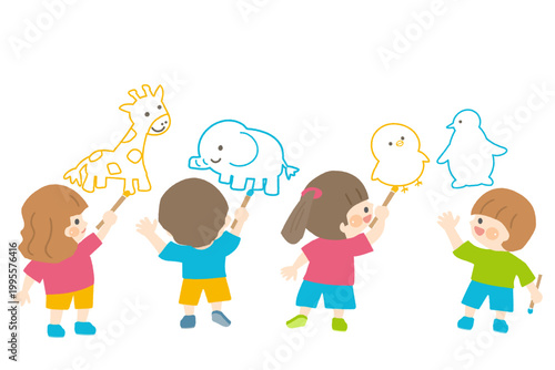 壁に動物の絵を描く子供たち