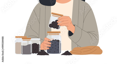 Woman storing black seeds or berries in glass jars, home gardening and food preservation concept