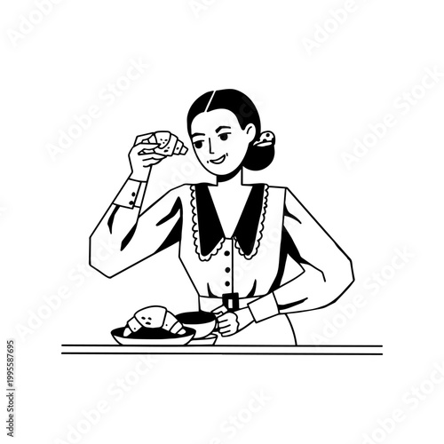 Woman is enjoying a croissant in the cafe.