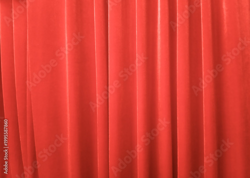 A defocused red background with folds. Space for creative text, advertising, or Christmas greetings. Copy space 