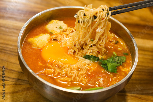 Canvastavla A bowl of Tom Yum Noodle Soup served in a metal bowl