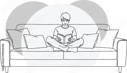 Peaceful rest and relaxation woman reading a book on a comfortable couch