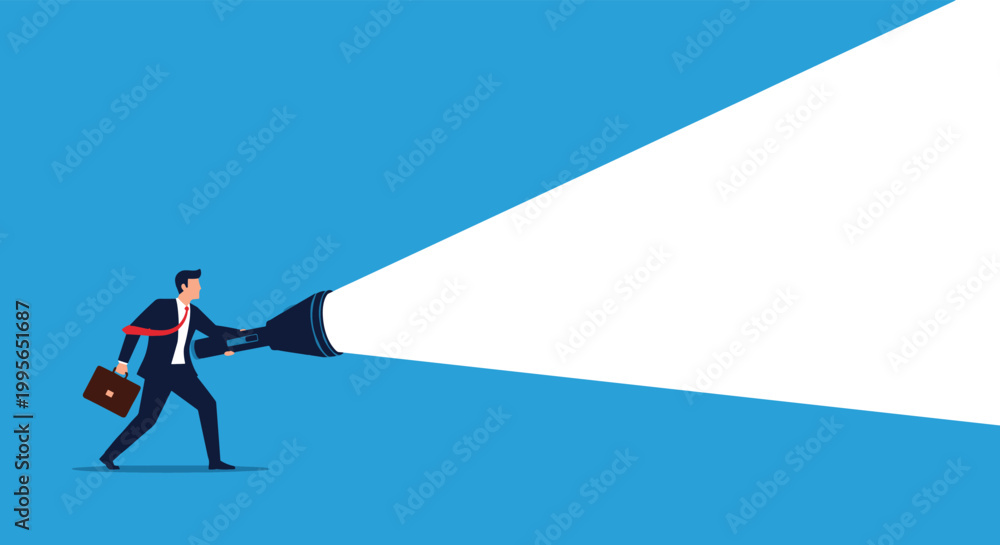 Fototapeta premium Businessman searching for solutions by holding a giant flashlight casting a bright beam across a blue background to find success.