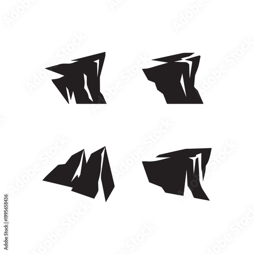Bold black abstract jagged rock and mountain peak silhouettes isolated on white