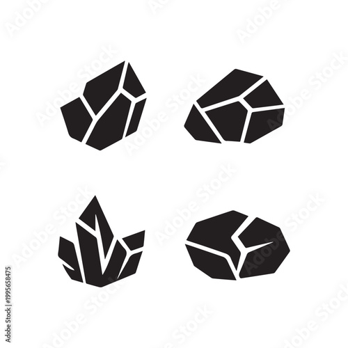 Abstract Collection of Sharp Faceted Black Crystal Shapes and Mineral Forms