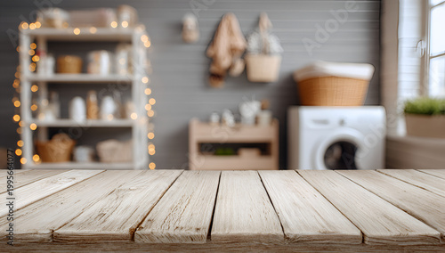 Empty wooden table in a blurred laundry room with washing machine.