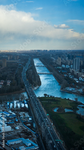 Aerial view of modern city development and ecological greenery along the Grand Canal in Tongzhou, Beijing, China