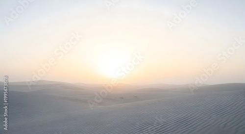 Abstract Soft Dawn Light Gradient with Pale Sand and Misty White Horizon Background