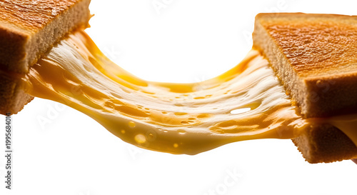 Melted cheese flows out of toasted sandwich on a plate indoors