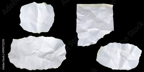 Fotografie Set of 4 white crumpled torn paper scraps isolated on black background